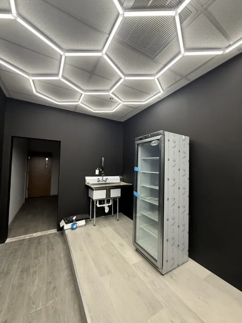 Retail renovation · Harrison — Back-of-shop lighting