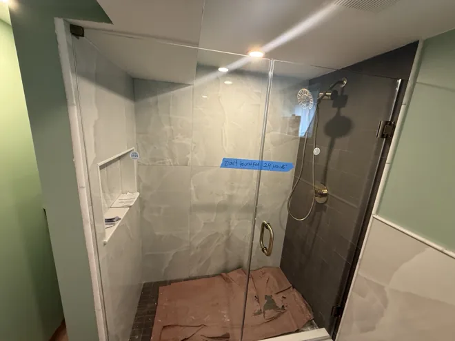 Glass shower & floating vanity