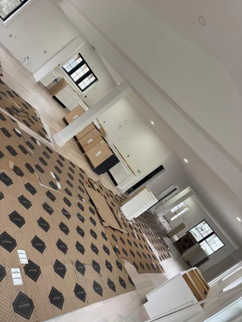 Floors & interior finishes — Patterned floor tile · installation stage