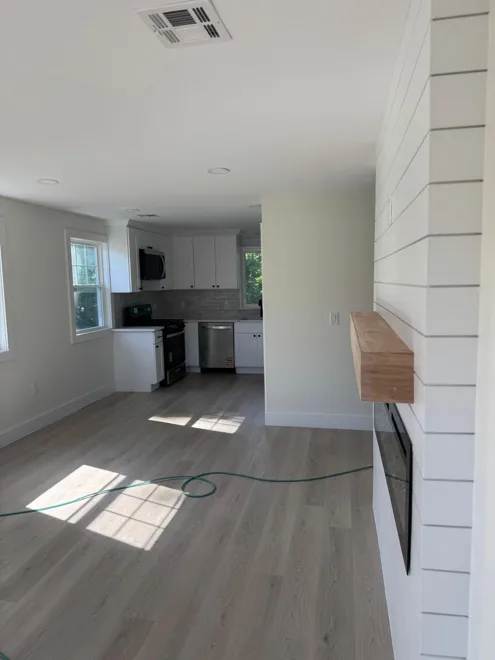 Kitchen, flooring & fireplace — Kitchen & living-area connection